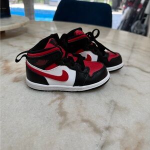 Nike Black and Red Sneakers Iconic High-Top Design